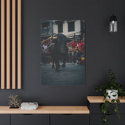 Bull Guided Through Festival Streets Wall Art & Canvas Print