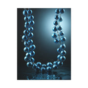 Blue Pearl Necklace Beneath Ocean Surface Wall Art & Canvas