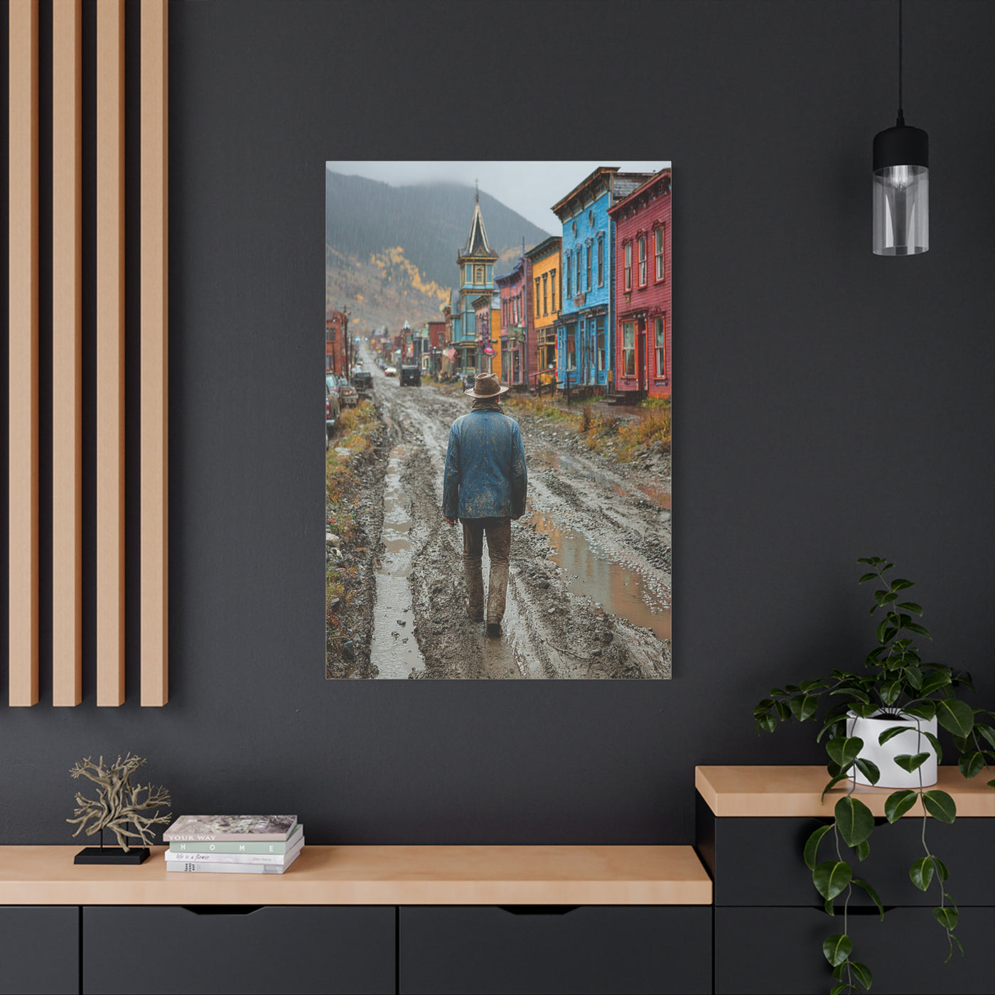 Lone Cowboy Walking Through a Rainy Frontier Street Wall Art & Canvas Print