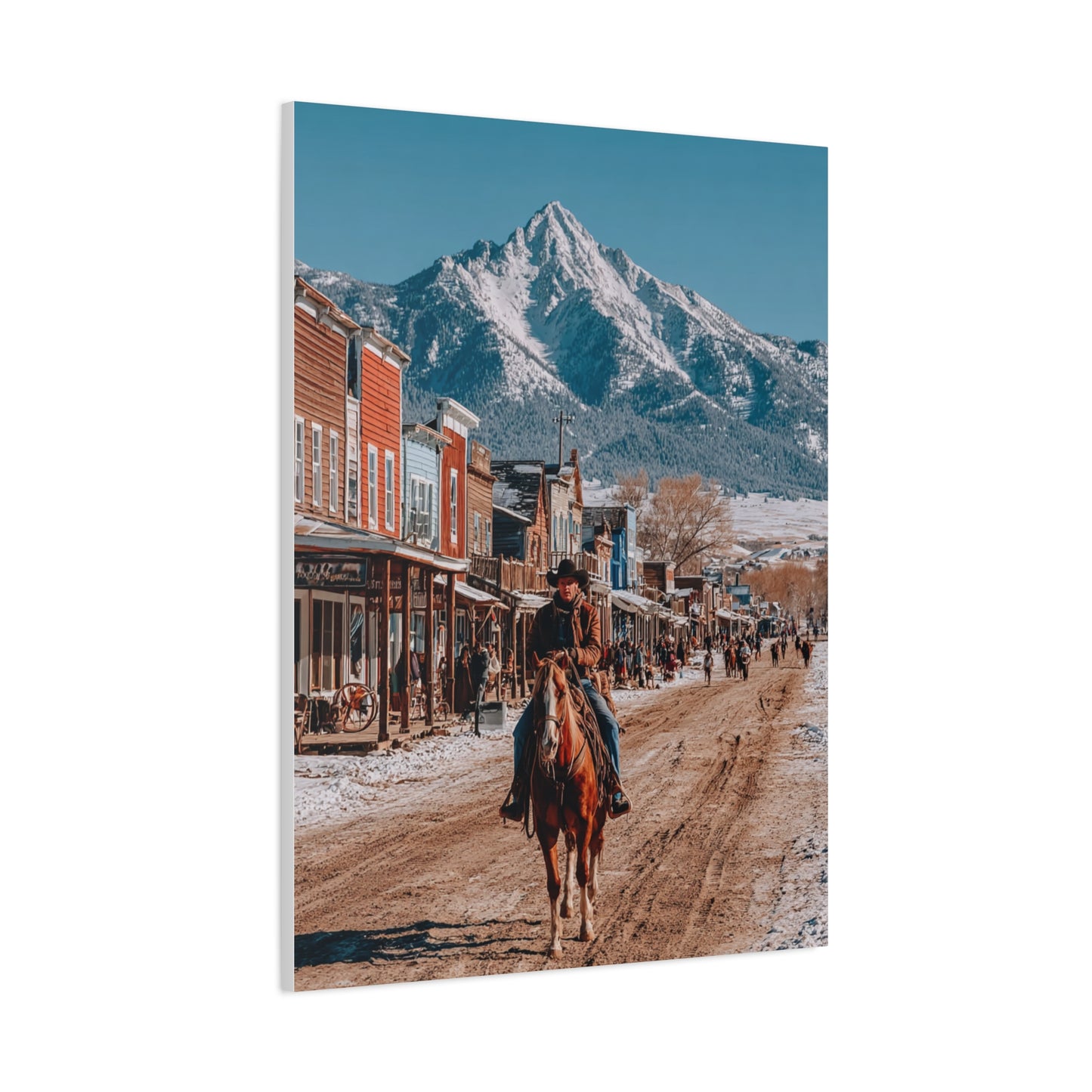 Cowboy Riding Through a Frontier Mountain Town Wall Art & Canvas Print